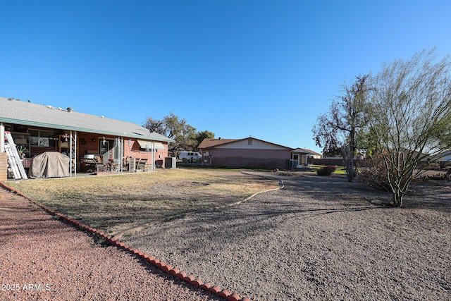 9735 W Ironwood Dr Unit A, Peoria, AZ 85345 - view of yard featuring a patio area
