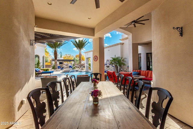 dining space featuring ceiling fan