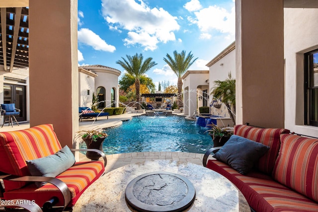 view of swimming pool with a patio and pool water feature