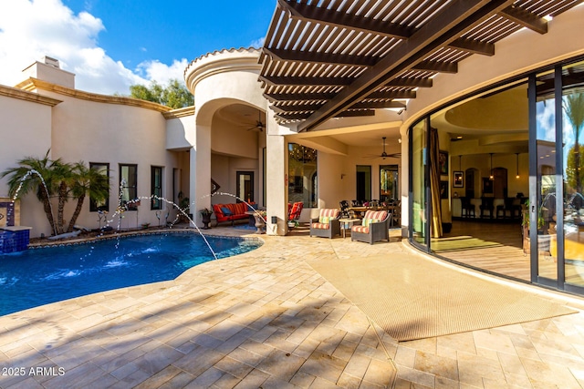 view of swimming pool featuring ceiling fan, a pergola, an outdoor living space, a patio area, and pool water feature