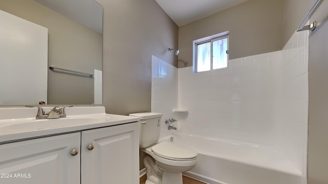 full bathroom featuring shower / tub combination, vanity, and toilet