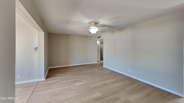 unfurnished room with ceiling fan and light hardwood / wood-style flooring