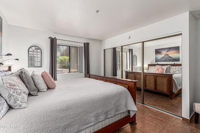 7777 E Main St Unit 143, Scottsdale, AZ 85251 - bedroom featuring a closet and tile patterned floors
