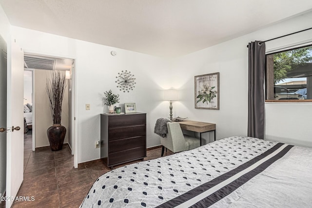 7777 E Main St Unit 143, Scottsdale, AZ 85251 - bedroom featuring tile patterned floors and baseboards