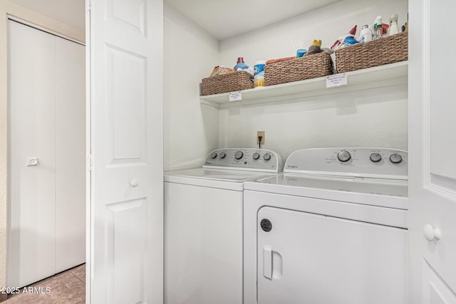 7777 E Main St Unit 143, Scottsdale, AZ 85251 - laundry area with washing machine and clothes dryer and light tile patterned floors