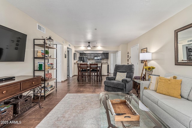 7777 E Main St Unit 143, Scottsdale, AZ 85251 - living room with dark tile patterned flooring