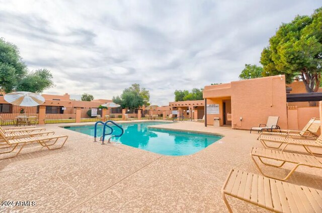 view of pool with a patio area