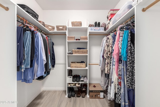 2075 W Silverlode Dr, Wickenburg, AZ 85390 - spacious closet featuring wood finished floors