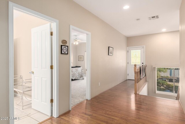 2075 W Silverlode Dr, Wickenburg, AZ 85390 - hall featuring light wood-type flooring, an upstairs landing, and recessed lighting