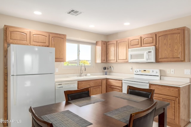 2075 W Silverlode Dr, Wickenburg, AZ 85390 - kitchen featuring white appliances, a sink, light brown cabinets, and recessed lighting