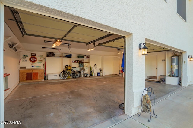 2075 W Silverlode Dr, Wickenburg, AZ 85390 - garage featuring water heater and a garage door opener