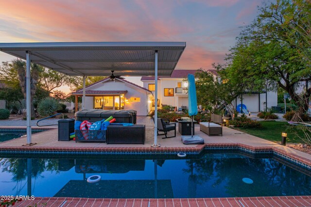 2075 W Silverlode Dr, Wickenburg, AZ 85390 - outdoor pool with a jacuzzi, a patio area, a ceiling fan, and an outdoor hangout area