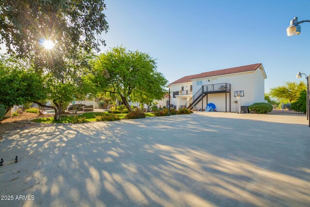 2075 W Silverlode Dr, Wickenburg, AZ 85390 - view of front facade featuring stairs and stucco siding