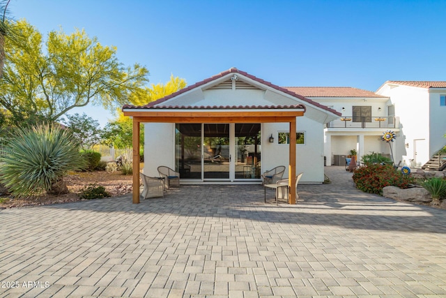 2075 W Silverlode Dr, Wickenburg, AZ 85390 - rear view of house featuring a patio, stucco siding, and a tiled roof