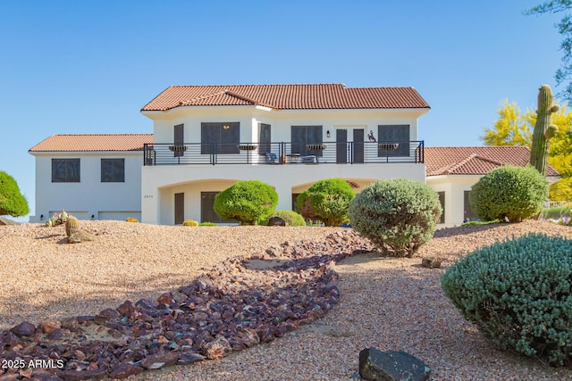 2075 W Silverlode Dr, Wickenburg, AZ 85390 - mediterranean / spanish-style home with a balcony, a tiled roof, and stucco siding