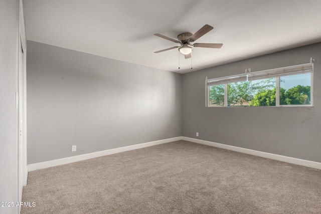 1747 W Devon, Mesa, AZ 85201 - carpeted empty room with a ceiling fan and baseboards