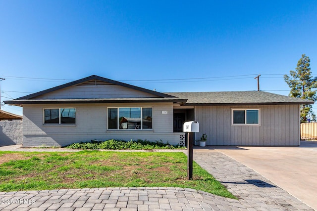 1747 W Devon, Mesa, AZ 85201 - ranch-style home featuring brick siding and a front lawn
