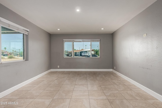 1747 W Devon, Mesa, AZ 85201 - empty room with recessed lighting and light tile patterned flooring
