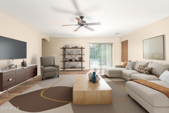 living room with ceiling fan