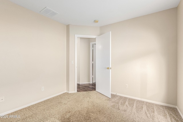 spare room with carpet flooring