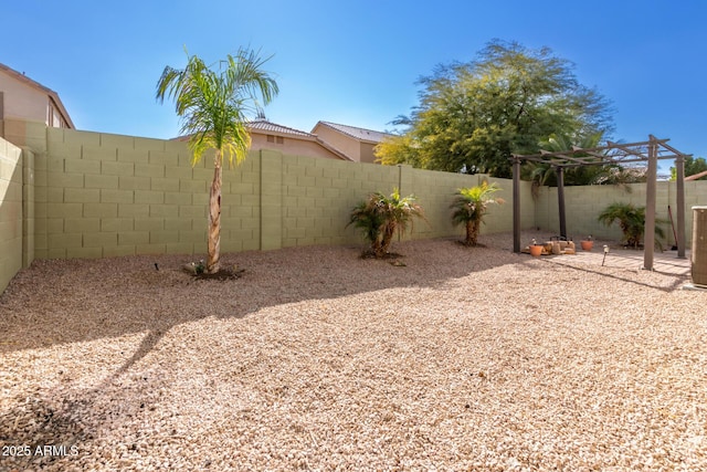 view of yard featuring a patio and a pergola