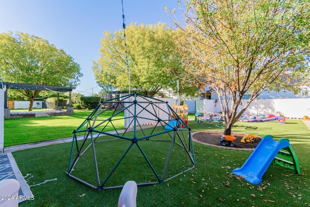 view of play area with a lawn