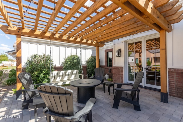 view of patio / terrace featuring a pergola and french doors