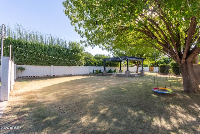 view of yard with a pergola