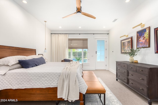 carpeted bedroom featuring access to outside and ceiling fan