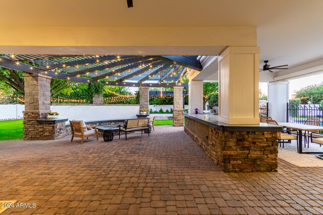 view of patio with a pergola and ceiling fan