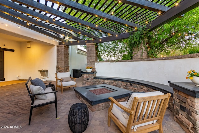 view of patio with a fire pit