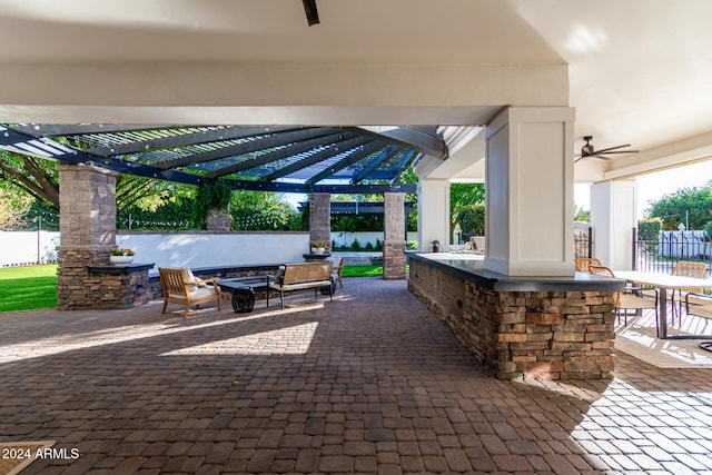 view of patio / terrace with a pergola and ceiling fan