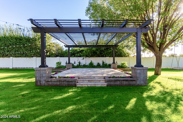 view of yard with a pergola and a patio