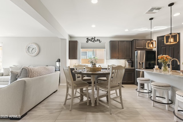 dining area with sink