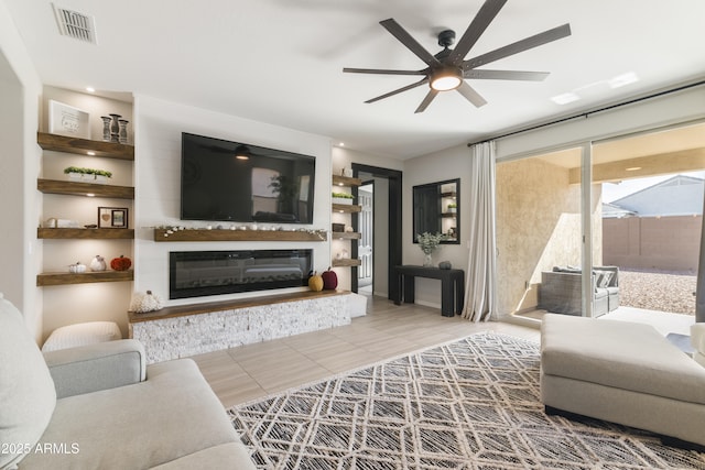 living room featuring ceiling fan