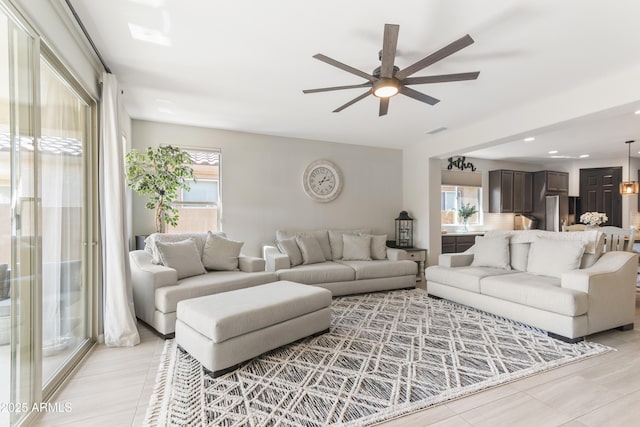 living room with ceiling fan