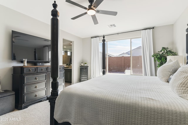 bedroom with connected bathroom and ceiling fan