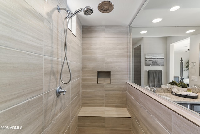 bathroom with a tile shower