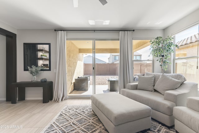 living room featuring ceiling fan