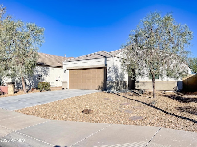 single story home with a garage