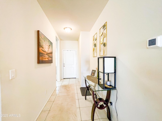 hallway featuring light tile patterned flooring