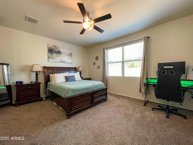 bedroom featuring light carpet and ceiling fan