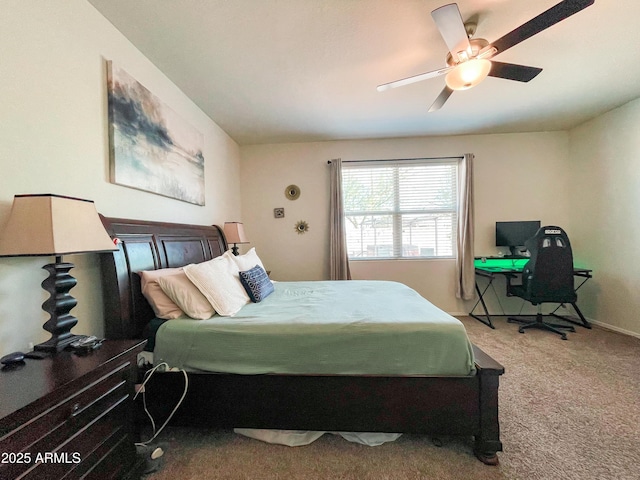 bedroom with ceiling fan and carpet flooring