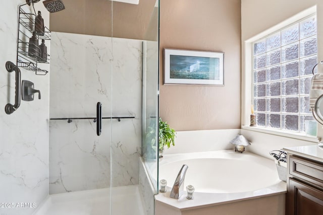 11861 E Becker Ln, Scottsdale, AZ 85259 - bathroom featuring a garden tub, a marble finish shower, healthy amount of natural light, and vanity