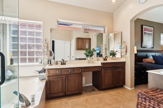 11861 E Becker Ln, Scottsdale, AZ 85259 - bathroom featuring double vanity, a garden tub, and tile patterned flooring