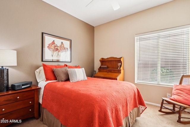 11861 E Becker Ln, Scottsdale, AZ 85259 - bedroom featuring light carpet and a ceiling fan