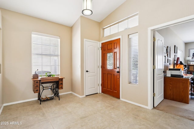 11861 E Becker Ln, Scottsdale, AZ 85259 - entryway featuring healthy amount of natural light and light tile patterned flooring