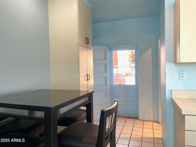 view of tiled dining space