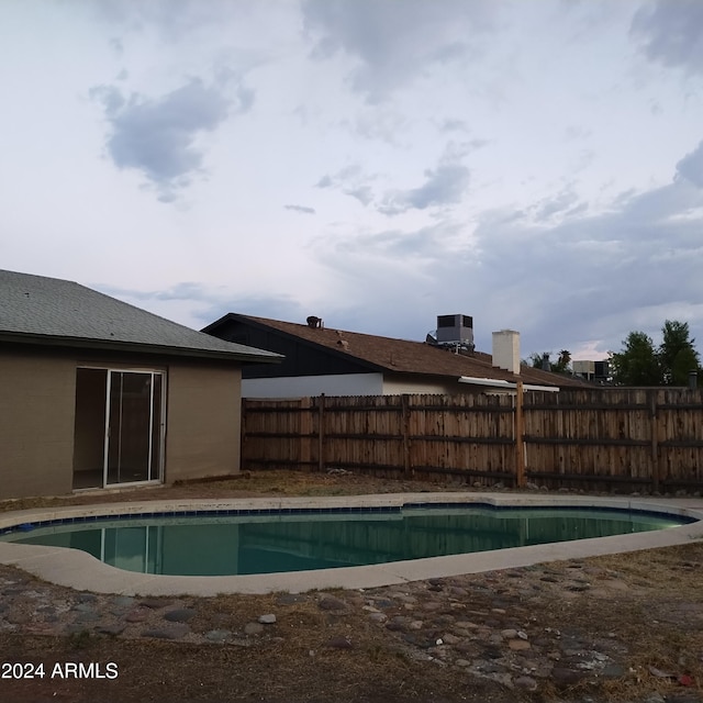 view of pool featuring cooling unit