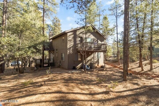 rear view of house with a deck